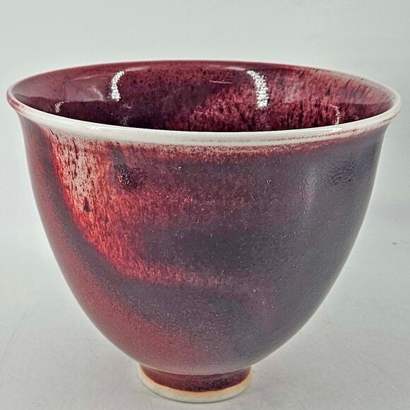 Oxblood burgundy wine artist Stan signed pottery bowl